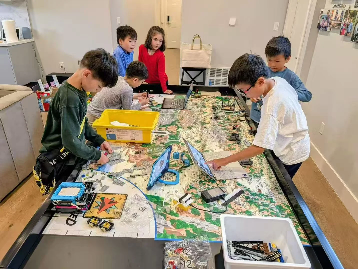 Students working around the robot field · FIRST US project