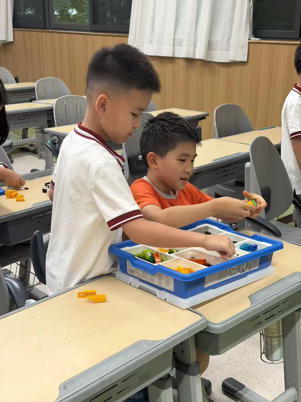 Students building and testing their work · School project photography