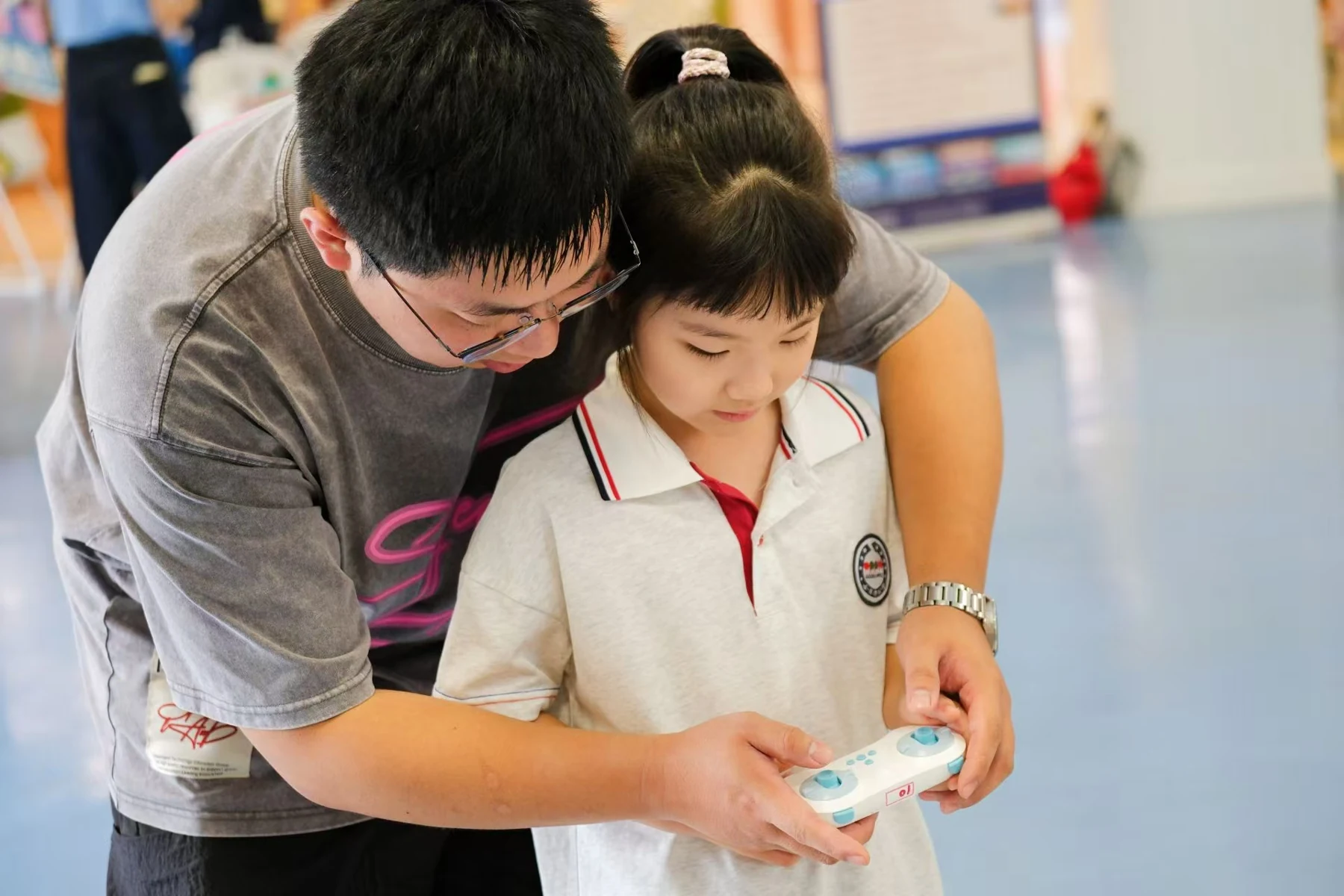 Educator guidance during a school learning activity · selected project photography