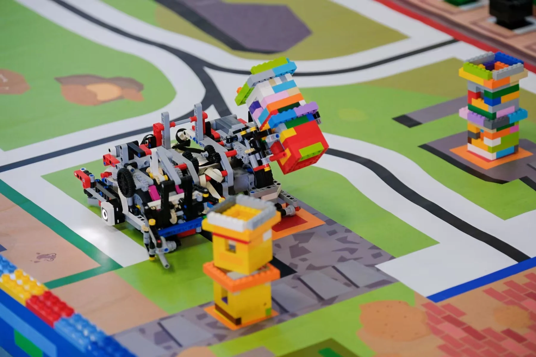 A student-built robot and practice field · school project photography