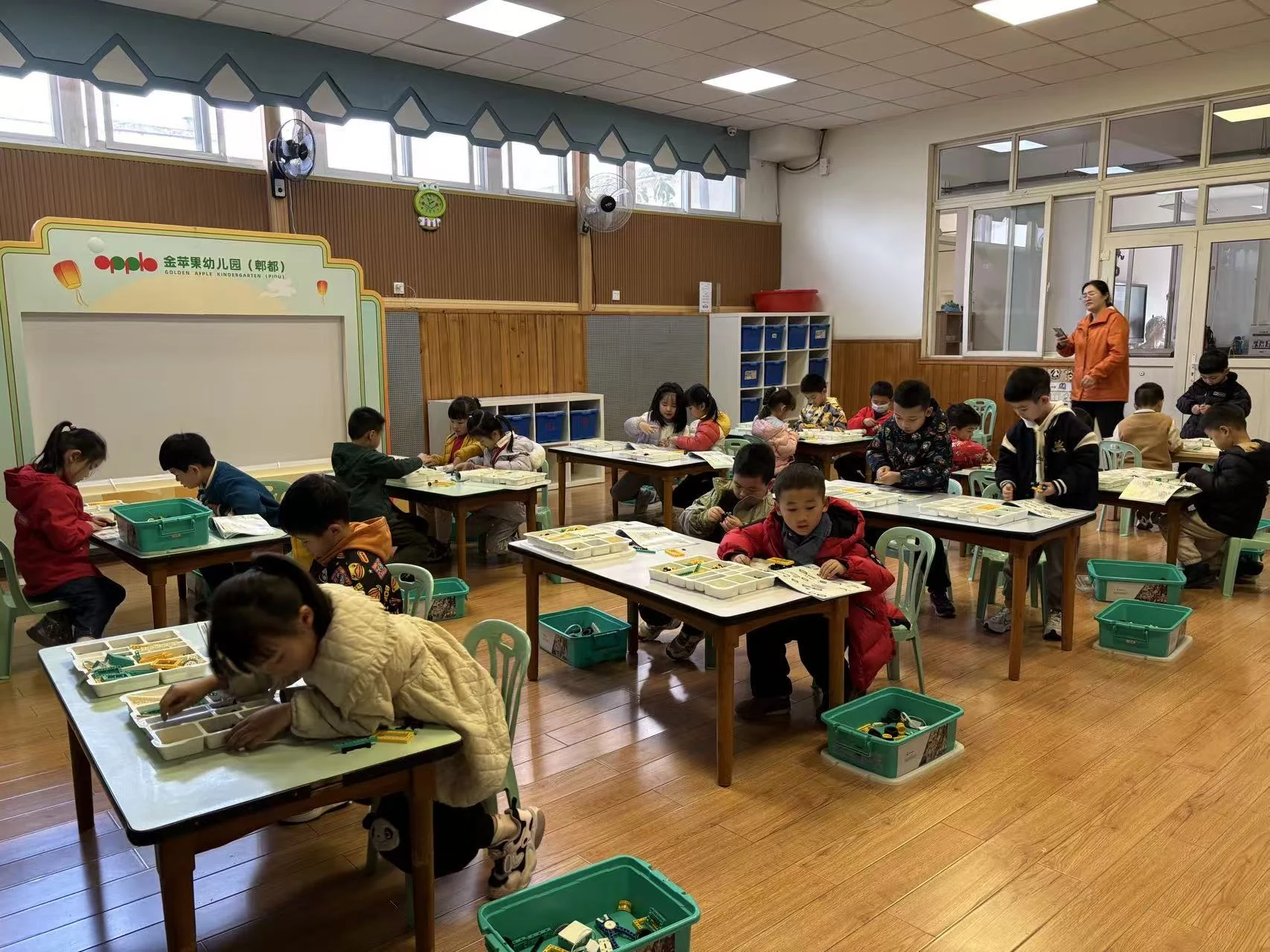 Whole-class learning at Gold Apple Kindergarten (Pidu) · selected project photography